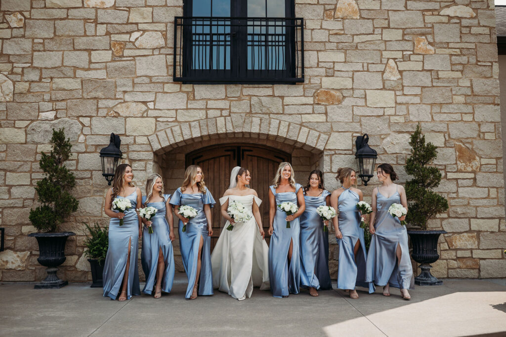 bride walking with bridesmaids at Silver Oaks Chateau wedding