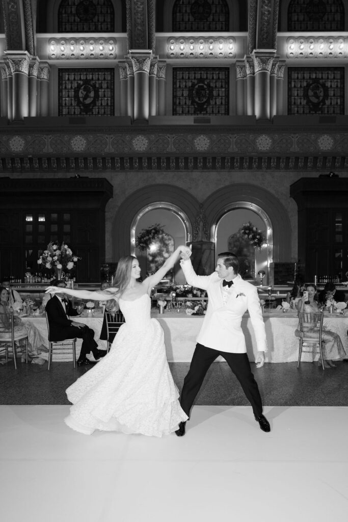 Bride and Groom twirl on the Union Station Hotel Wedding Dance Floor