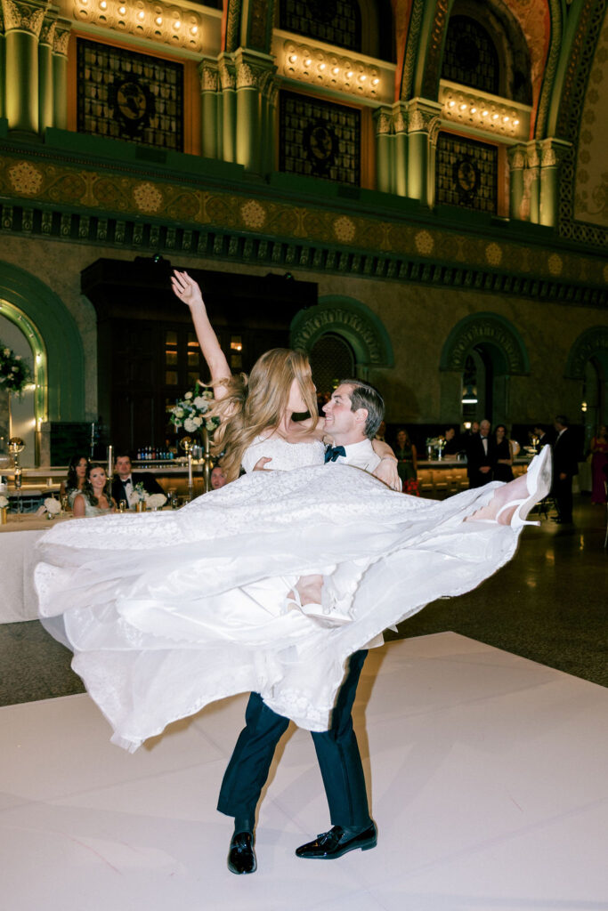 Bride and Groom twirl on the Union Station Hotel Wedding Dance Floor