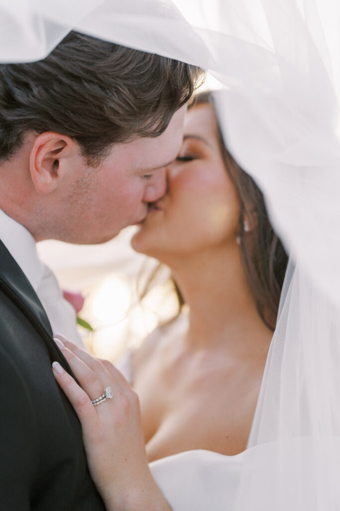 bride and groom kiss