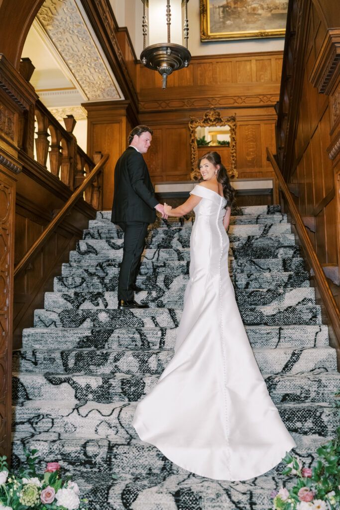 bride and groom on Missouri Athletic Club Wedding stairs