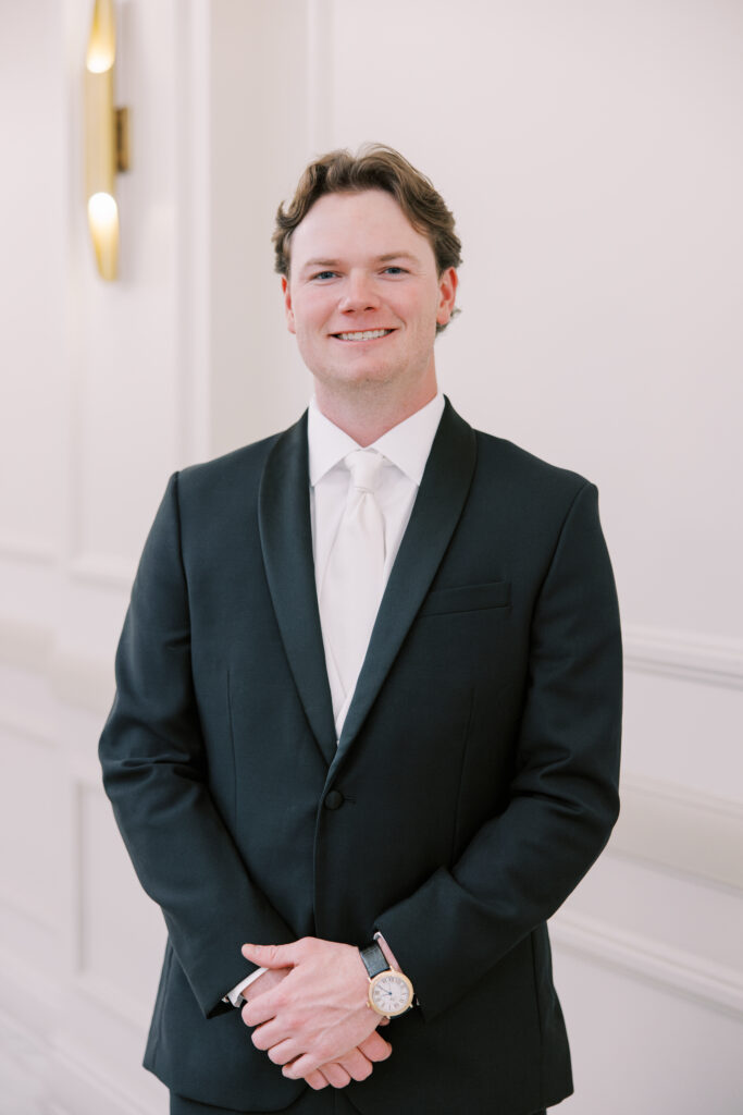 groom smiling at camera